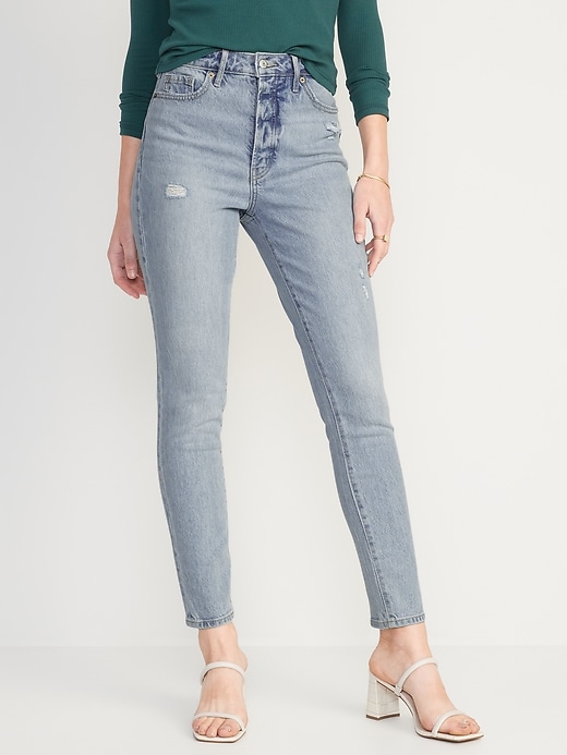 Image number 1 showing, Extra High-Waisted Hidden Button-Fly Pop Icon Distressed Skinny Jeans