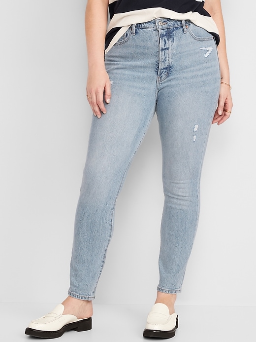 Image number 5 showing, Extra High-Waisted Hidden Button-Fly Pop Icon Distressed Skinny Jeans